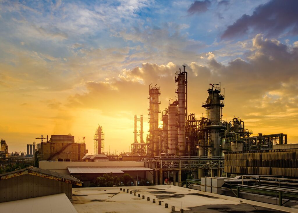 Petrochemical factory with sunrise in backdrop